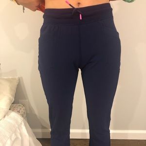 Ivivva royal blue sweatpants, zippers at ankles.